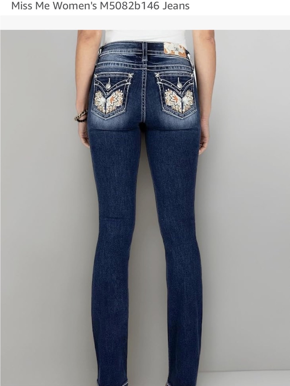 Miss Me Mid Rise Boot Jeans with Embroidered Butterfly Pockets.